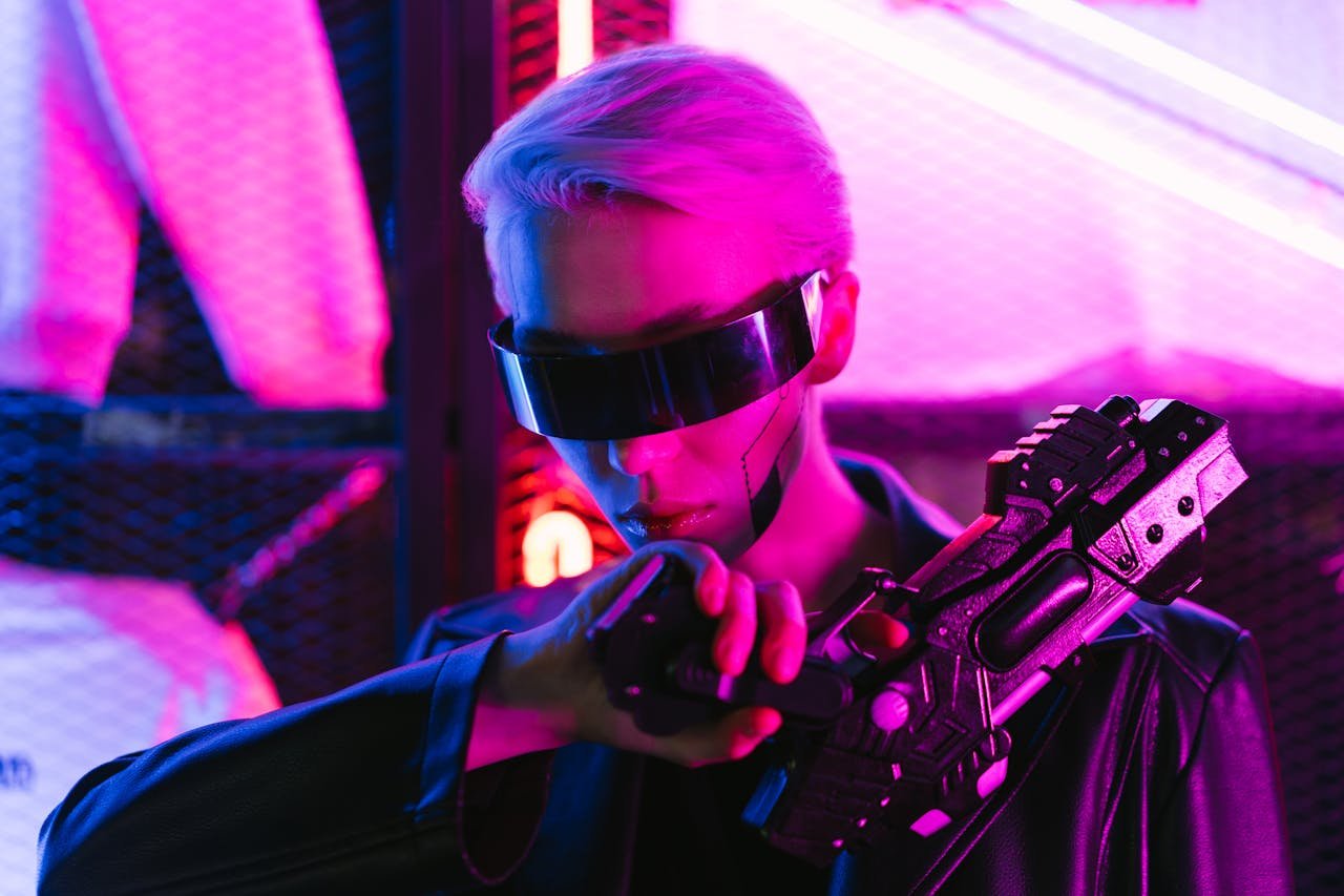 A stylish woman in cyberpunk attire poses with a futuristic gun under neon lights.